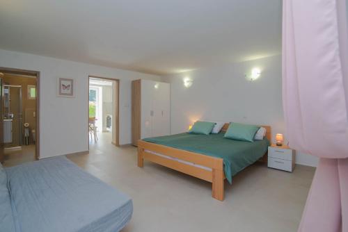 Postel nebo postele na pokoji v ubytování Marija