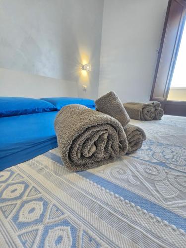 Giường trong phòng chung tại Tenuta Valle Incanto