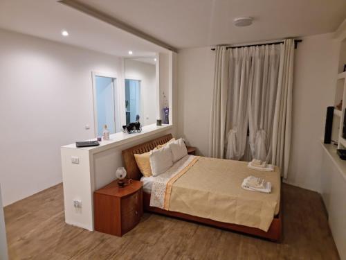 Postel nebo postele na pokoji v ubytování Home ANISIA