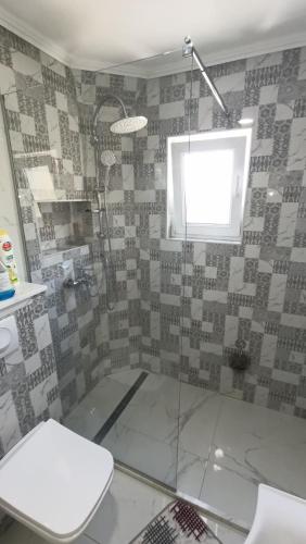 Ein Badezimmer in der Unterkunft Vila AMNA - Ilidža