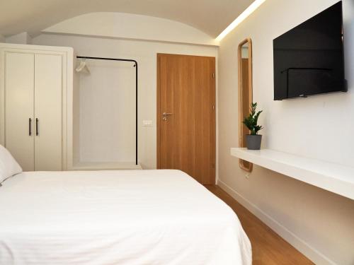 Times Elegant Roomsにあるベッド