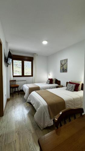 Postel nebo postele na pokoji v ubytování Casa rural Gerardo