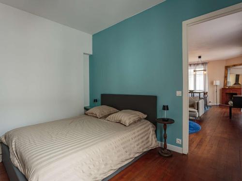 Ένα ή περισσότερα κρεβάτια σε δωμάτιο στο Bel appartement moderne à 2 pas de la plage et rue piétonne, centre-ville, calme, WIFI inclus - FR-1-4-692