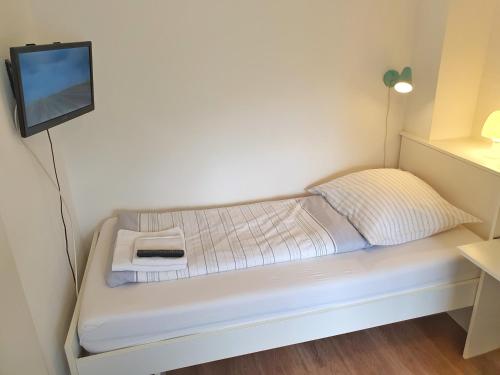 Ένα ή περισσότερα κρεβάτια σε δωμάτιο στο Aparthotel Jonas