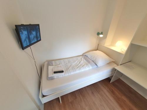 Ένα ή περισσότερα κρεβάτια σε δωμάτιο στο Aparthotel Jonas