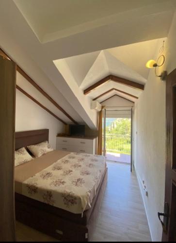 Una cama o camas en una habitación de Lux apartmani Darija