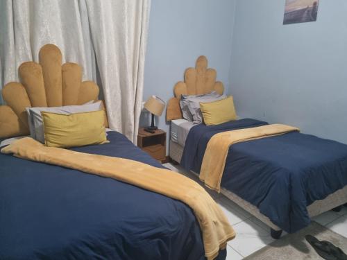 Katil atau katil-katil dalam bilik di Michu Guest house