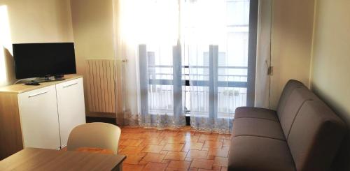 TV a/nebo společenská místnost v ubytování AMOROSO FAMILY