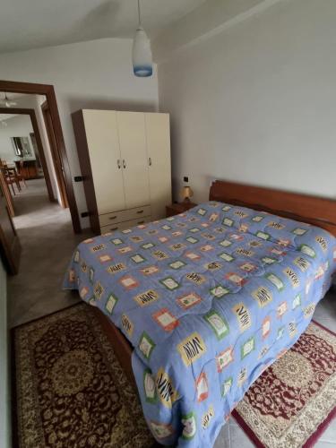 Ένα ή περισσότερα κρεβάτια σε δωμάτιο στο la dimora delle nevi