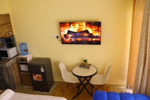 TV a/nebo společenská místnost v ubytování CK Homes