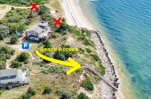 an aerial view of a beach area with a house at Unique waterfront home with stunning views in Wellfleet