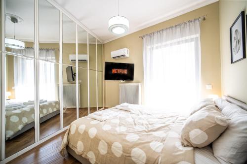 Postel nebo postele na pokoji v ubytování ΜΚ Αpartment 2ΥΔ - Nikea Metro