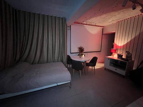 Postel nebo postele na pokoji v ubytování DNA Apartment