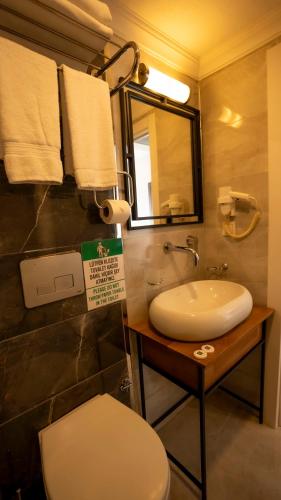 Un baño de Farina Hotel By Cigno