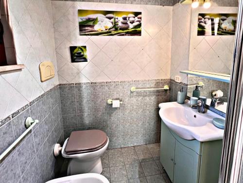 Ένα μπάνιο στο Le Dune Home