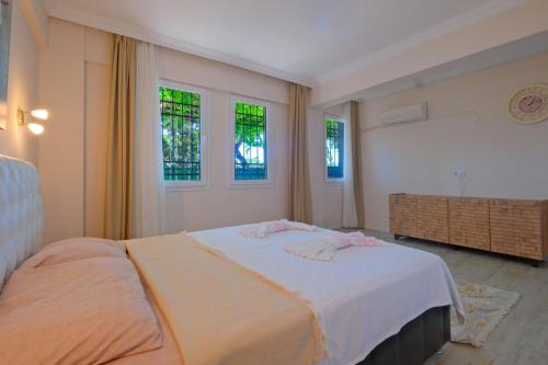 Postel nebo postele na pokoji v ubytování Villa Lavin