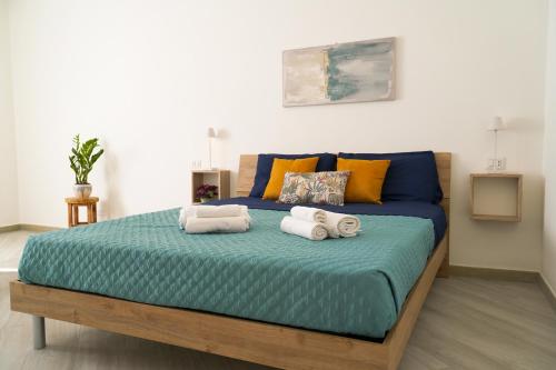 Postel nebo postele na pokoji v ubytování Il Vicolo - Vacanze in Sardegna