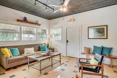a living room with a couch and a table at Walk to Historic Dtwn Sanford Home with Gas Grill! in Sanford