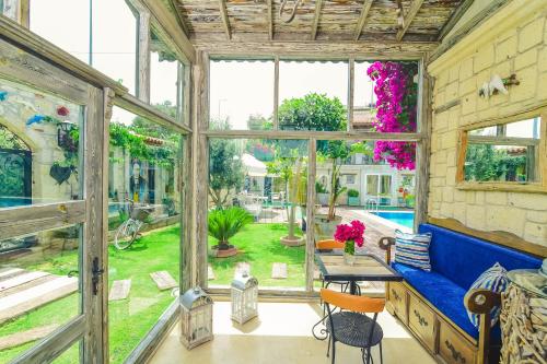 Jardín al aire libre en Rüzgargülü Otel