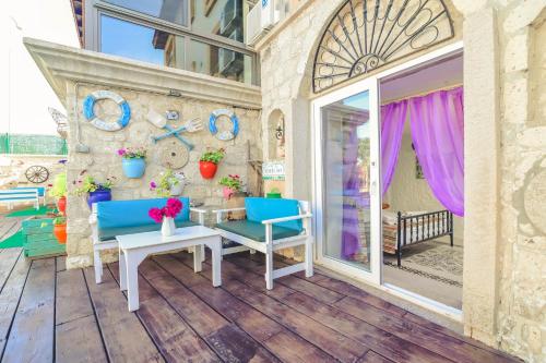 Un balcón o terraza de Rüzgargülü Otel