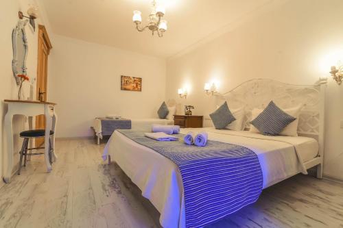 Cama o camas de una habitación en Rüzgargülü Otel