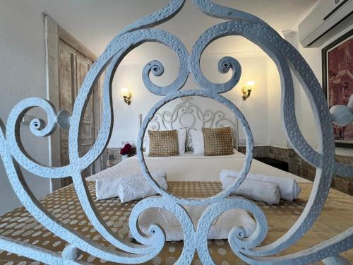 Cama o camas de una habitación en Rüzgargülü Otel