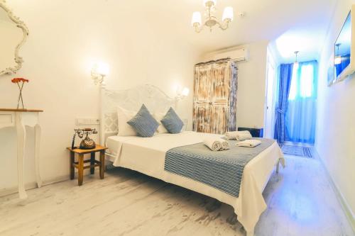 Cama o camas de una habitación en Rüzgargülü Otel