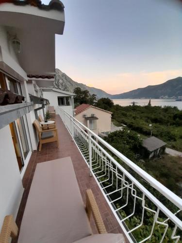 a balcony with a view of the water at Lux apartmani Darija in Kotor