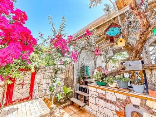 Un balcón o terraza de Rüzgargülü Otel