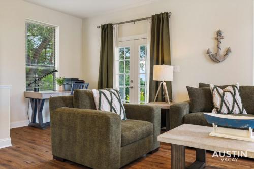 a living room with two chairs and a couch at Lakeway Hideaway Cool Spot by The Colorado River in Austin