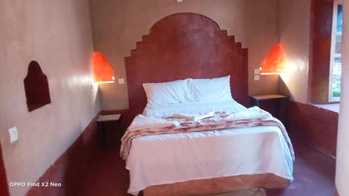 Ένα ή περισσότερα κρεβάτια σε δωμάτιο στο KASBAH IFRi