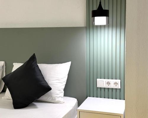 Katil atau katil-katil dalam bilik di Bossa Nova Apart Hotel