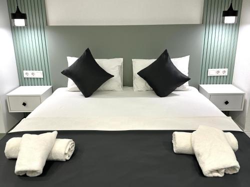 Katil atau katil-katil dalam bilik di Bossa Nova Apart Hotel