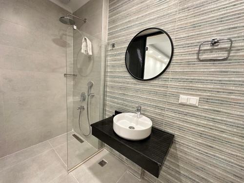 Bilik mandi di Bossa Nova Apart Hotel