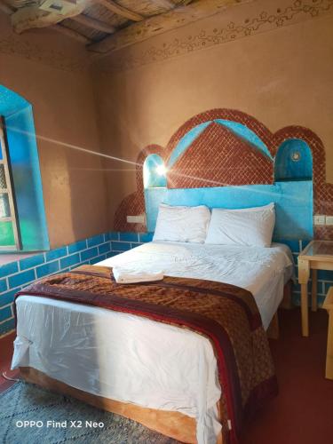 Ένα ή περισσότερα κρεβάτια σε δωμάτιο στο KASBAH IFRi