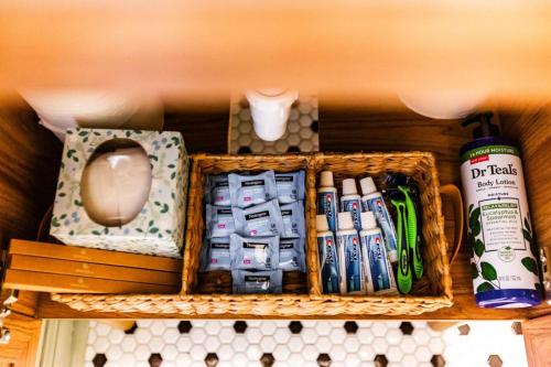 a basket filled with different items on a shelf at The Green House - Central location PTC - Trilith in Tyrone