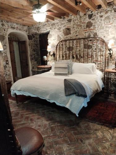 Cama o camas de una habitación en Hacienda Las Amantes