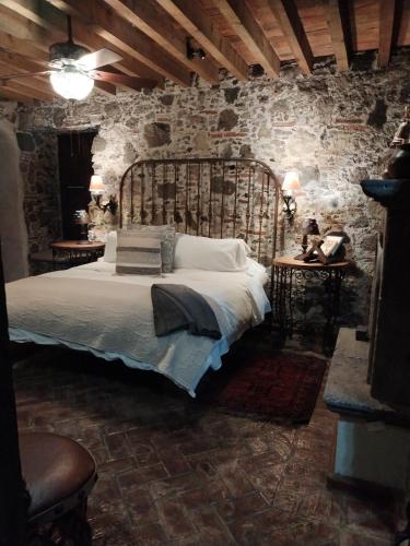 Cama o camas de una habitación en Hacienda Las Amantes