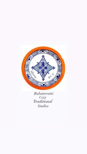 a blue and white plate with a star on it at Babatseratsi skyrian studio 1 in Skiros