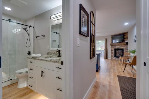 a bathroom with a shower and a toilet and a sink at Estes Park Vacation Rental 1 Mi to National Park in Estes Park