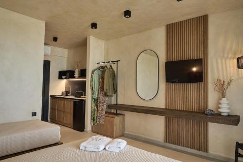 Ein Bett oder Betten in einem Zimmer der Unterkunft Casa Tsouka ApartHotel