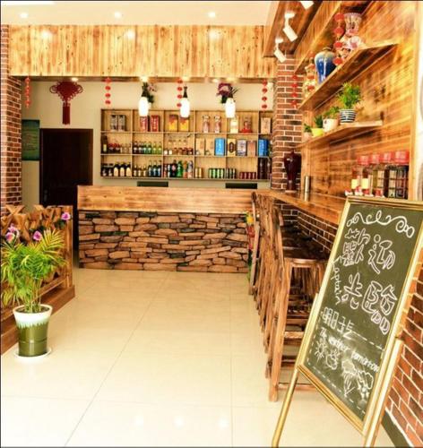 Huangshan Tangkou Haoshi International Youth Hostelにあるラウンジまたはバー