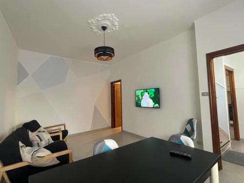 TV a/nebo společenská místnost v ubytování La Finestra sul Borgo