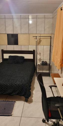 Ένα ή περισσότερα κρεβάτια σε δωμάτιο στο Carcará Hostel Ipanema - Espaço Cultural
