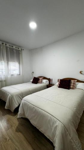 Postel nebo postele na pokoji v ubytování Casa rural Gerardo