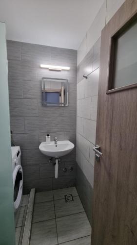 a bathroom with a sink and a toilet at G-House Skiathos in Skiathos