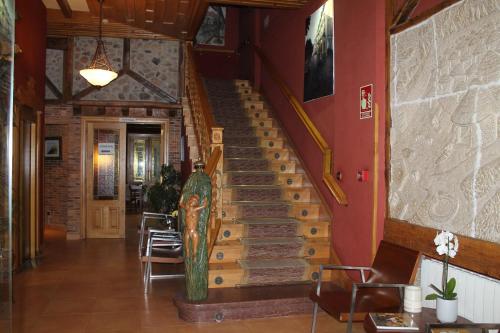 a staircase in a building with a skateboard on it at Hotel San Roque in Reinosa