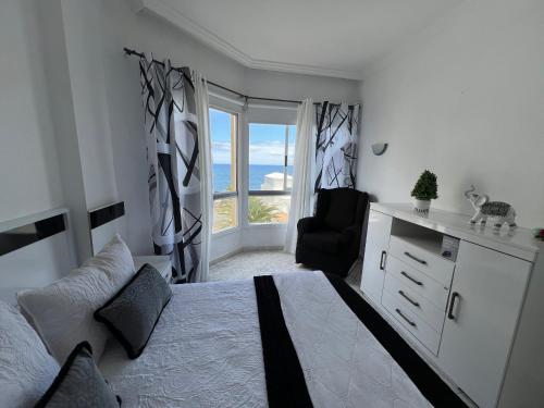 Postel nebo postele na pokoji v ubytování La casita de Omar en el corazón del Puerto de la Cruz