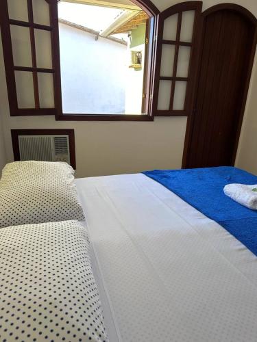 Postel nebo postele na pokoji v ubytování Pousada Encanto Torrely Búzios