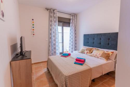 Postel nebo postele na pokoji v ubytování Todimer new pueblo mediteraneo